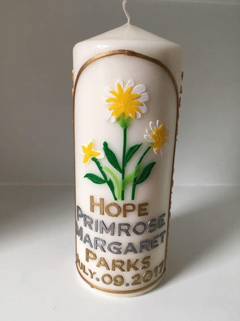 Candle for Hope Primrose Margaret Parks decorated with yellow daisies
